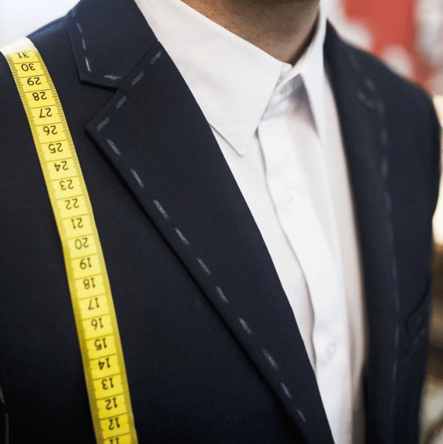 Men with a tape measure