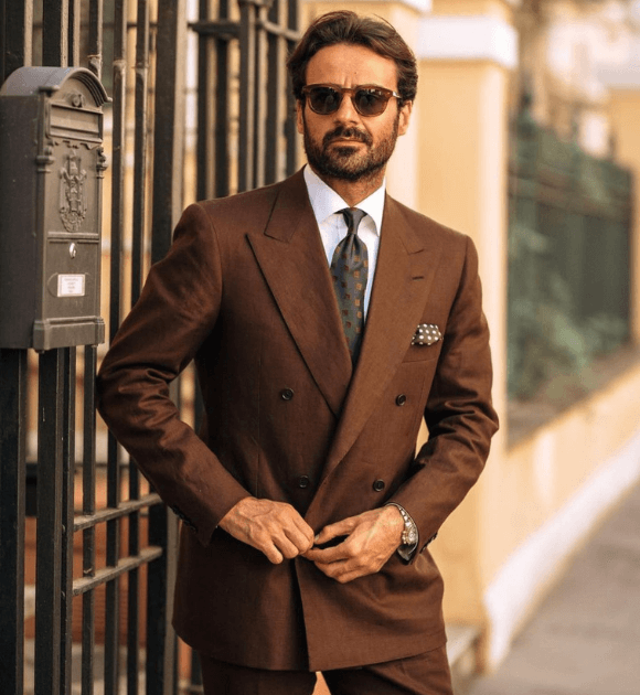 A man in a brown suit
