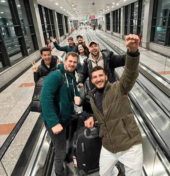 Group of men in airport