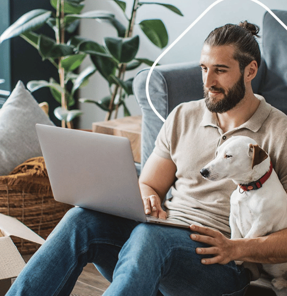 Men and dog with a laptop
