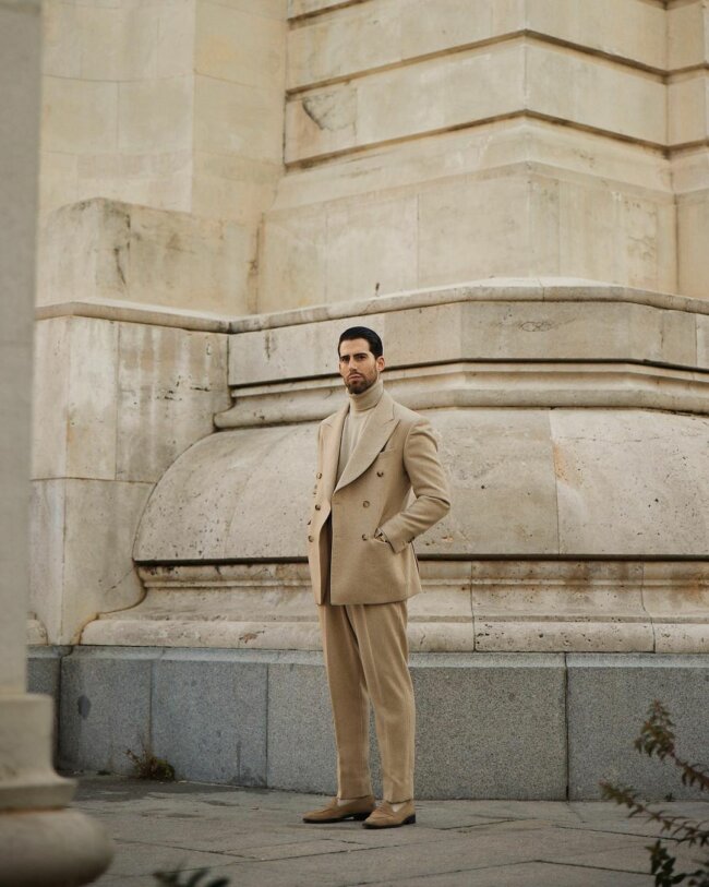 A sleek beige suit, perfect for summer. 