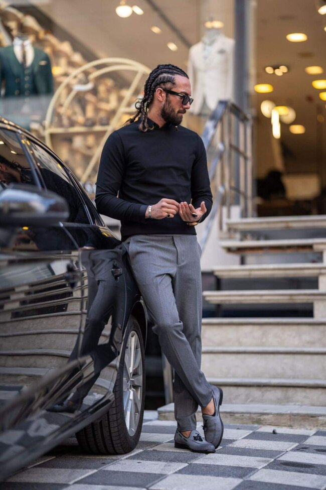 A sophisticated and refined look with a black sweater. 