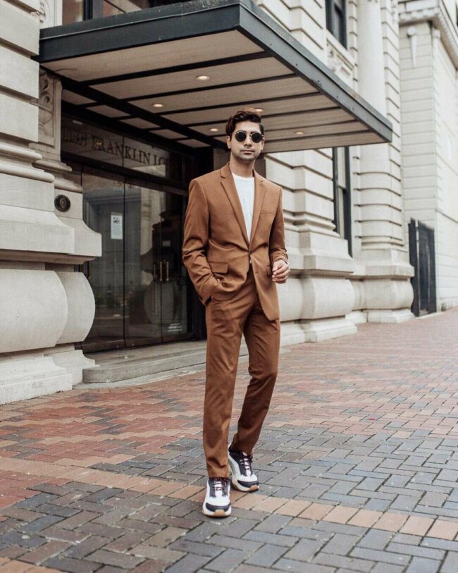 A chic look with a camel colored suit.