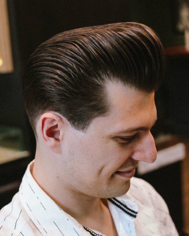 A unique and classy look with a classic pompadour cut. 