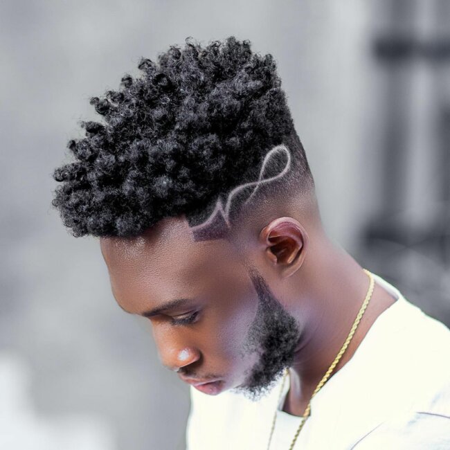 A stylish look with a curly mohawk. 