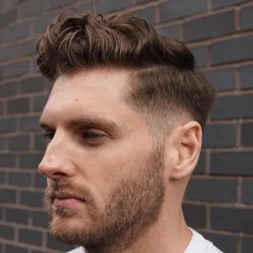 A classy curly pompadour look. 
