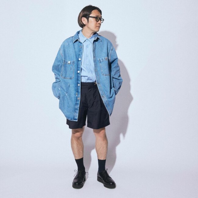 A denim shirt with shorts offers a trendy look with comfort.