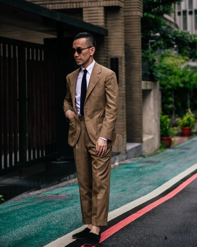A vintage khaki suit, offering the perfect formal look. 