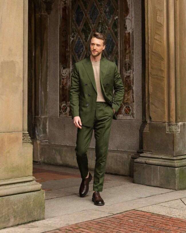 A classy look with an olive green suit. 
