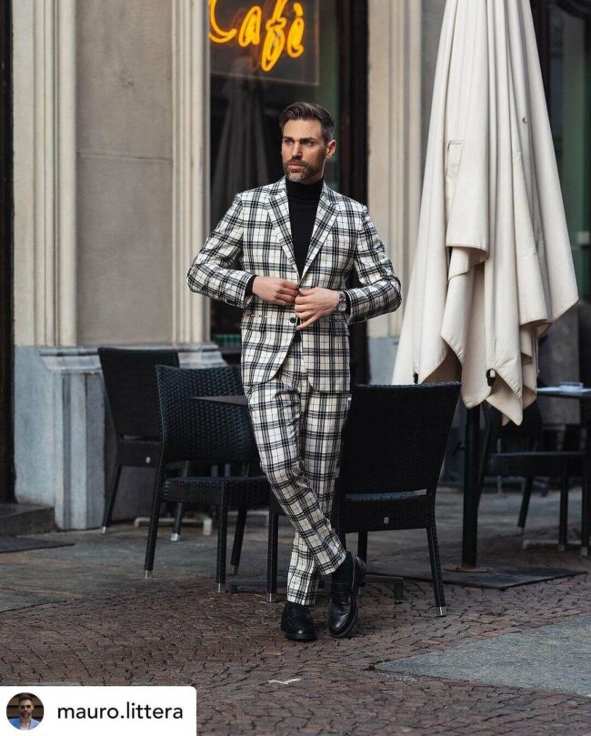 A sleek look with a plaid suit. 