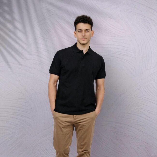A solid polo paired with chinos offer a fine summer look.