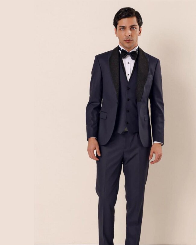 A stylish look with a shawl collar suit.