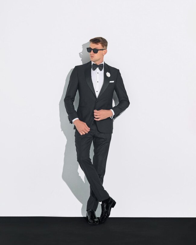 A chic shawl collar tuxedo suit for weddings.