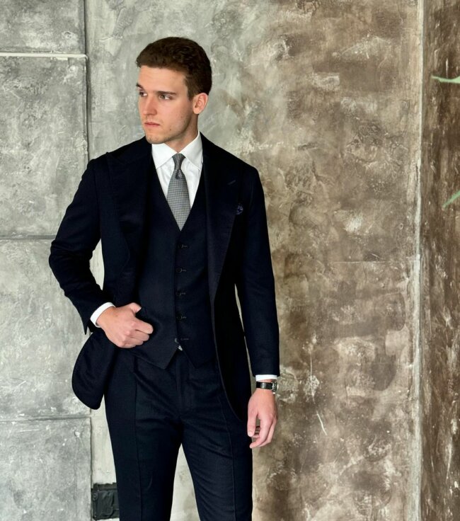 An elegant three piece suit, offering a fancy look. 
