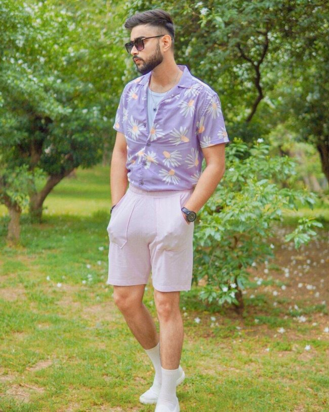 A tropical look with floral printed shirt. 
