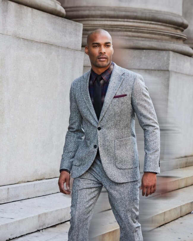 A tweed suit offering charm and vintage energy.