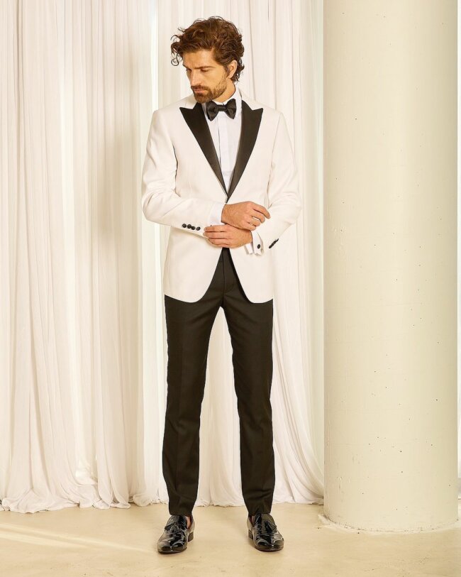 A unique look with a classy white dinner jacket.
