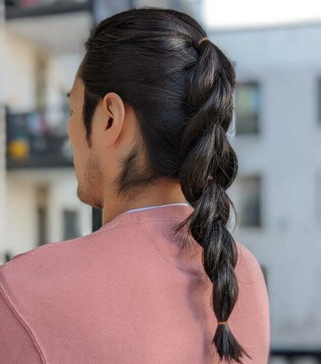 A convenient hairstyle featuring a braided ponytail. 